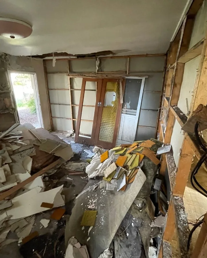 The inside of a derelict house before renovation, from the Charlie Property website